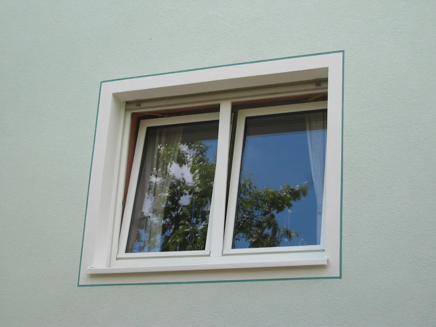Rico Hellebrandt - Putz+Farbgestaltung, Haus Außenfenster